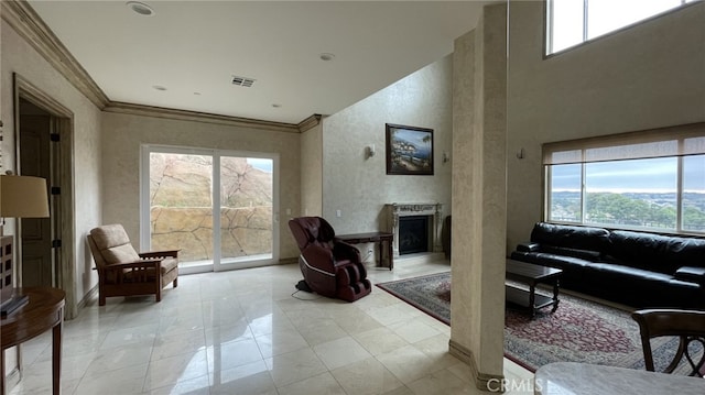 tiled living room featuring crown molding