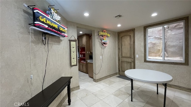 interior space featuring tile floors and a wealth of natural light