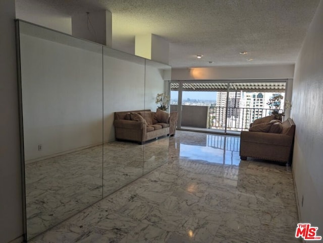 interior space featuring a textured ceiling