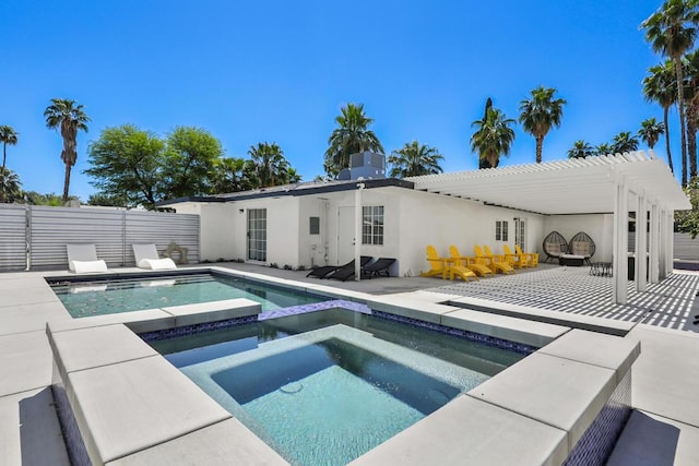 view of swimming pool with a pergola, a patio area, and an in ground hot tub