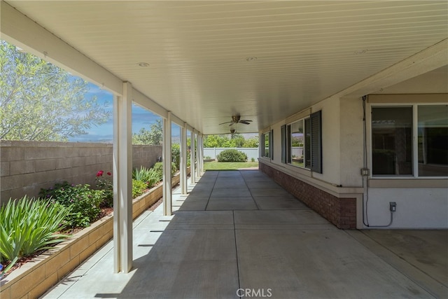 view of patio featuring ceiling fan