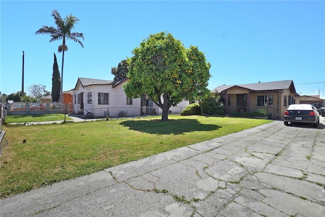 single story home with a front yard