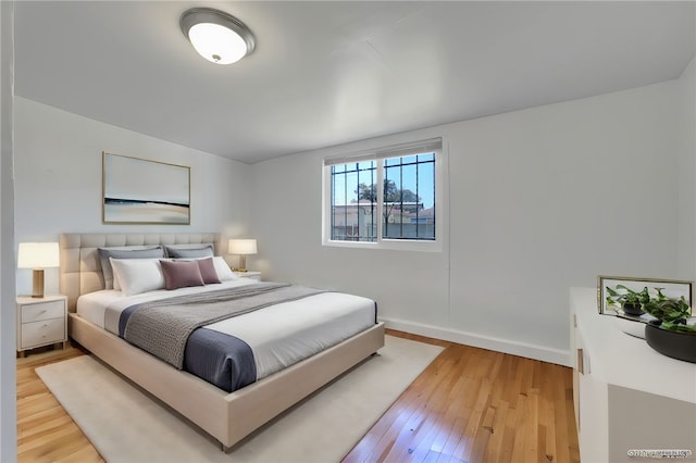 bedroom featuring hardwood / wood-style floors