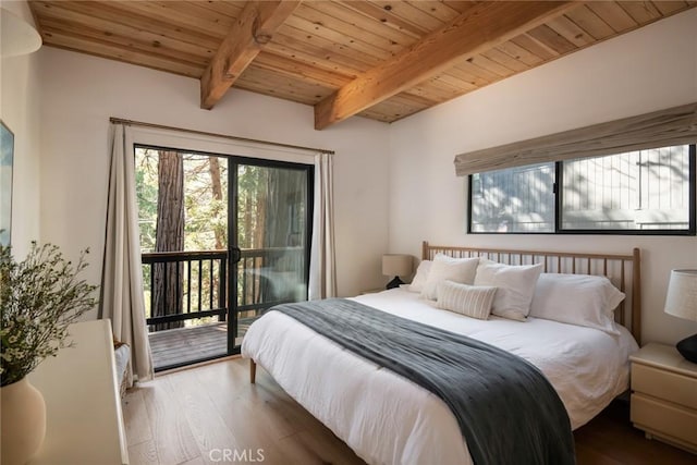 bedroom featuring hardwood / wood-style floors, access to exterior, wooden ceiling, and beamed ceiling