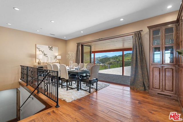 dining area featuring hardwood / wood-style floors