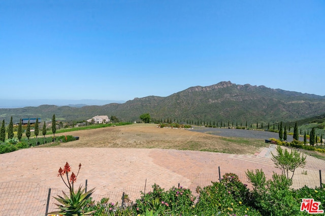 property view of mountains with a rural view