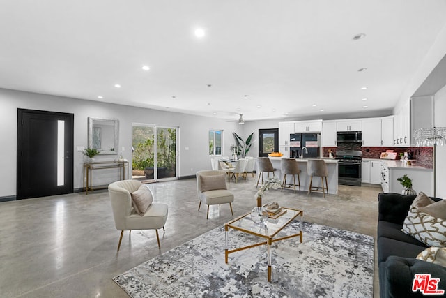 living room featuring ceiling fan