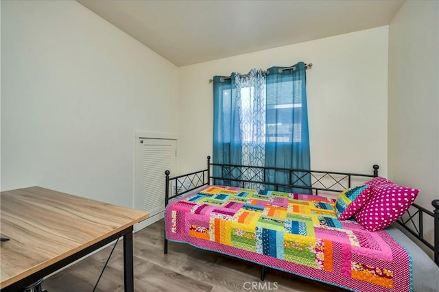 bedroom featuring hardwood / wood-style floors