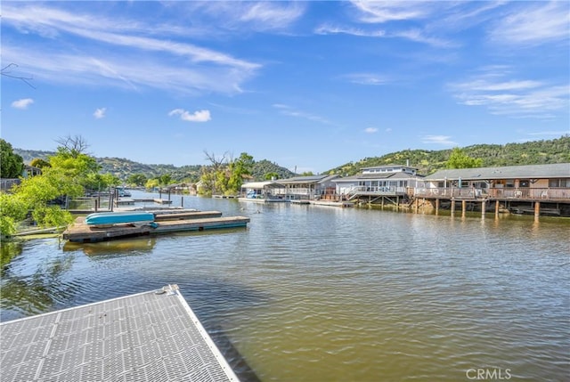 view of dock with a water view