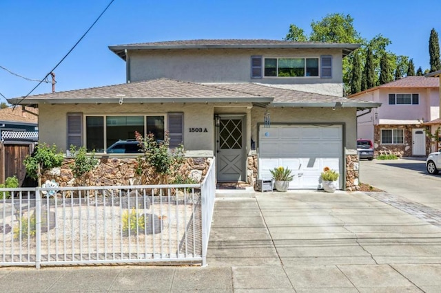 view of front of property with a garage