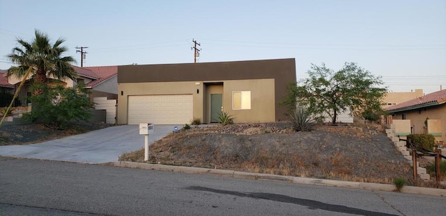 view of front of home with a garage