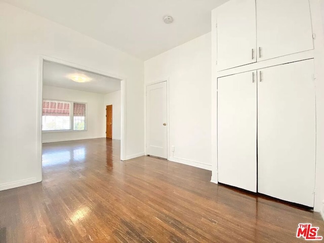 interior space with hardwood / wood-style floors