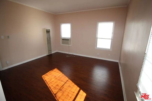 empty room featuring dark hardwood / wood-style flooring