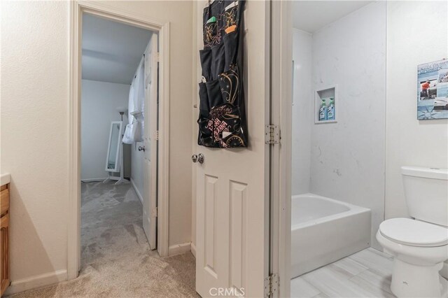 full bathroom featuring shower / bath combination, toilet, and vanity