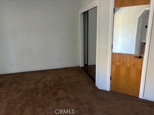 interior space featuring carpet and a closet