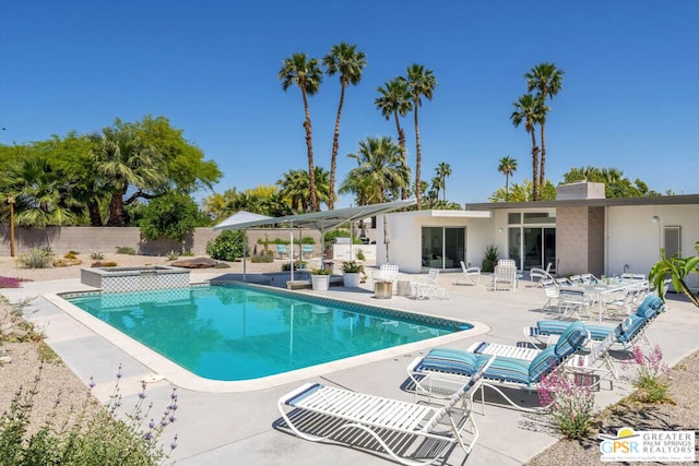 view of pool featuring a patio area