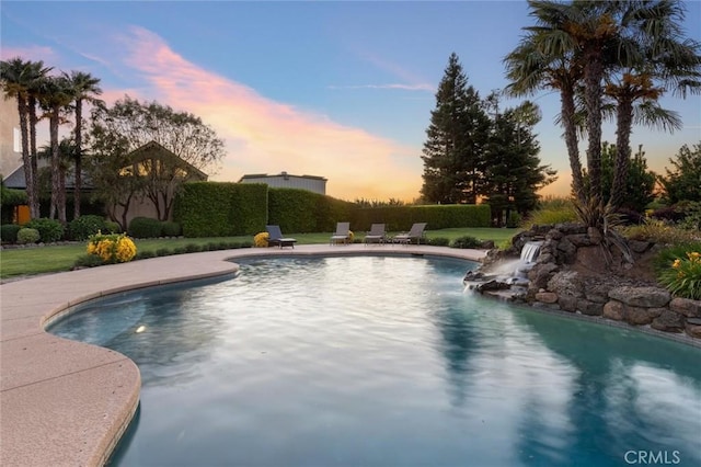 view of pool with a fenced in pool