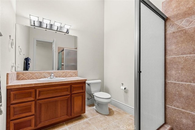 bathroom with backsplash, toilet, a shower stall, vanity, and tile patterned floors