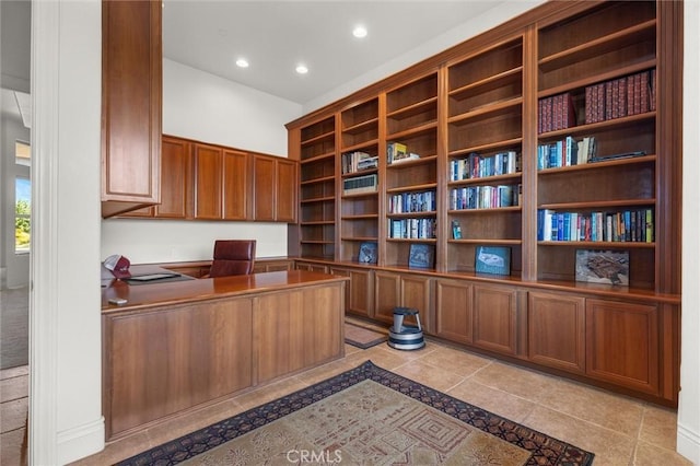 office area featuring light tile patterned flooring, built in study area, and recessed lighting