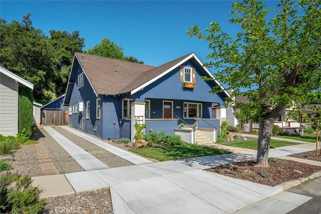 bungalow-style home with covered porch