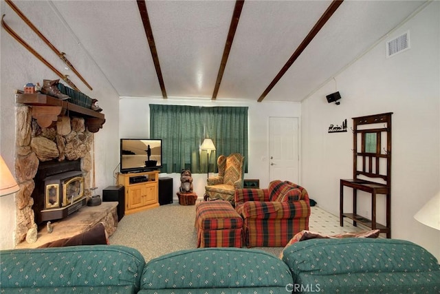 carpeted living room with lofted ceiling with beams and a wood stove