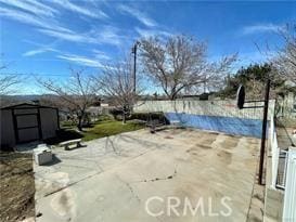 view of patio / terrace with a covered pool