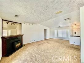 unfurnished living room with vaulted ceiling and a fireplace