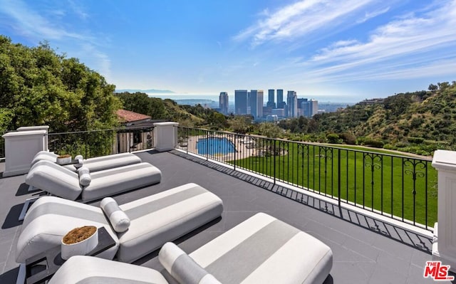 view of patio with a pool