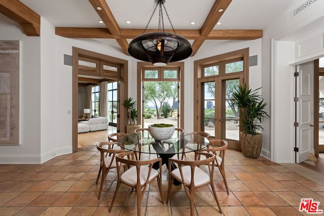 unfurnished dining area with beam ceiling, french doors, light tile patterned flooring, and coffered ceiling