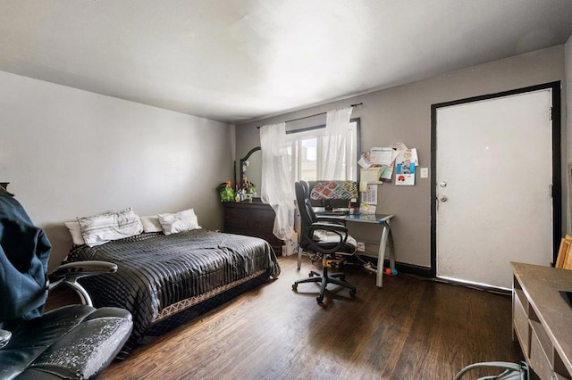 bedroom featuring wood-type flooring