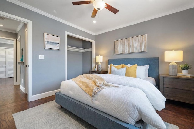 bedroom featuring a closet, ceiling fan, and ornamental molding