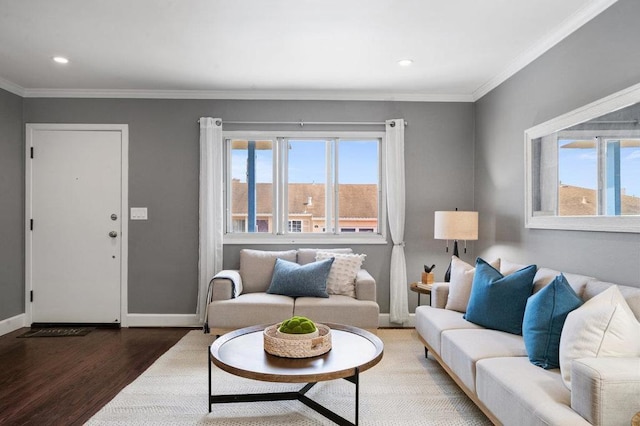 living room featuring wood-type flooring and ornamental molding