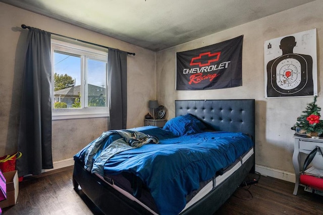 bedroom featuring hardwood / wood-style floors