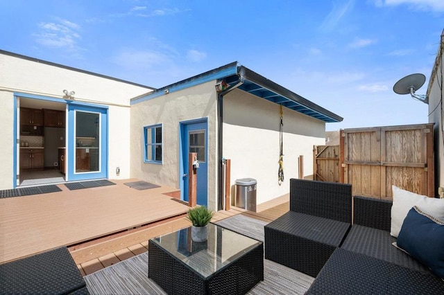 wooden deck with an outdoor hangout area