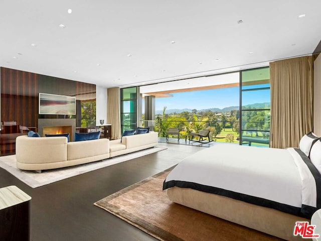 bedroom with a wall of windows