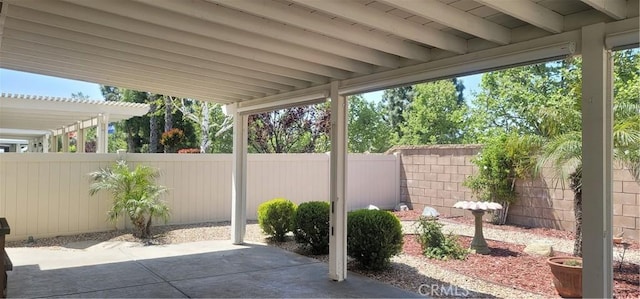 view of patio featuring a fenced backyard and a pergola