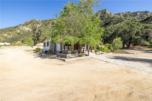 view of front of house with a mountain view