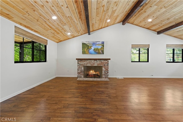 unfurnished living room featuring hardwood / wood-style floors, lofted ceiling with beams, a brick fireplace, and wood ceiling