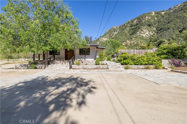 obstructed view of property featuring a mountain view