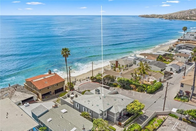 bird's eye view with a residential view and a water view