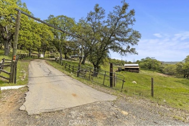 view of road featuring a rural view