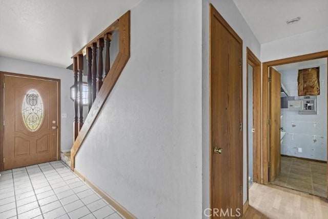 foyer featuring light tile patterned flooring