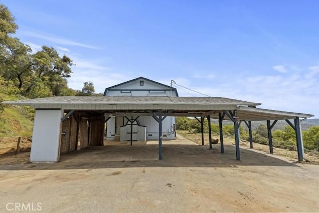 view of car parking featuring a carport