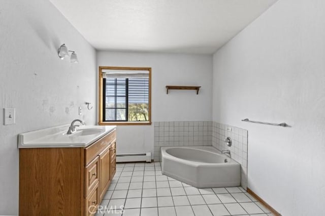 bathroom with baseboard heating, a tub, tile patterned flooring, and vanity