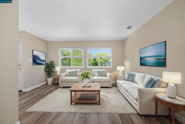 living room with light hardwood / wood-style floors