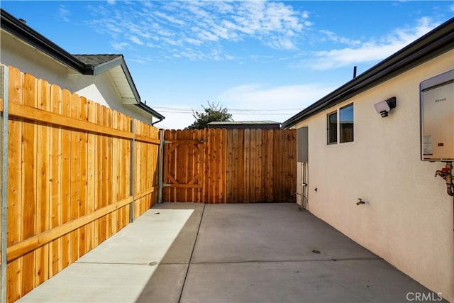 view of patio / terrace featuring fence