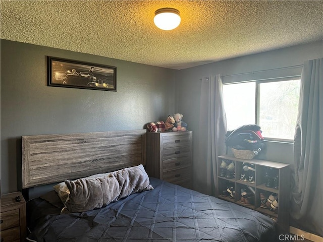 bedroom with a textured ceiling