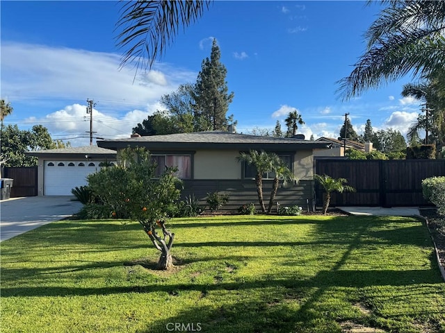 single story home featuring a front yard and a garage