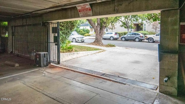 garage featuring a carport