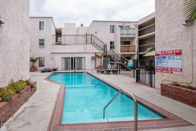 view of pool with a patio